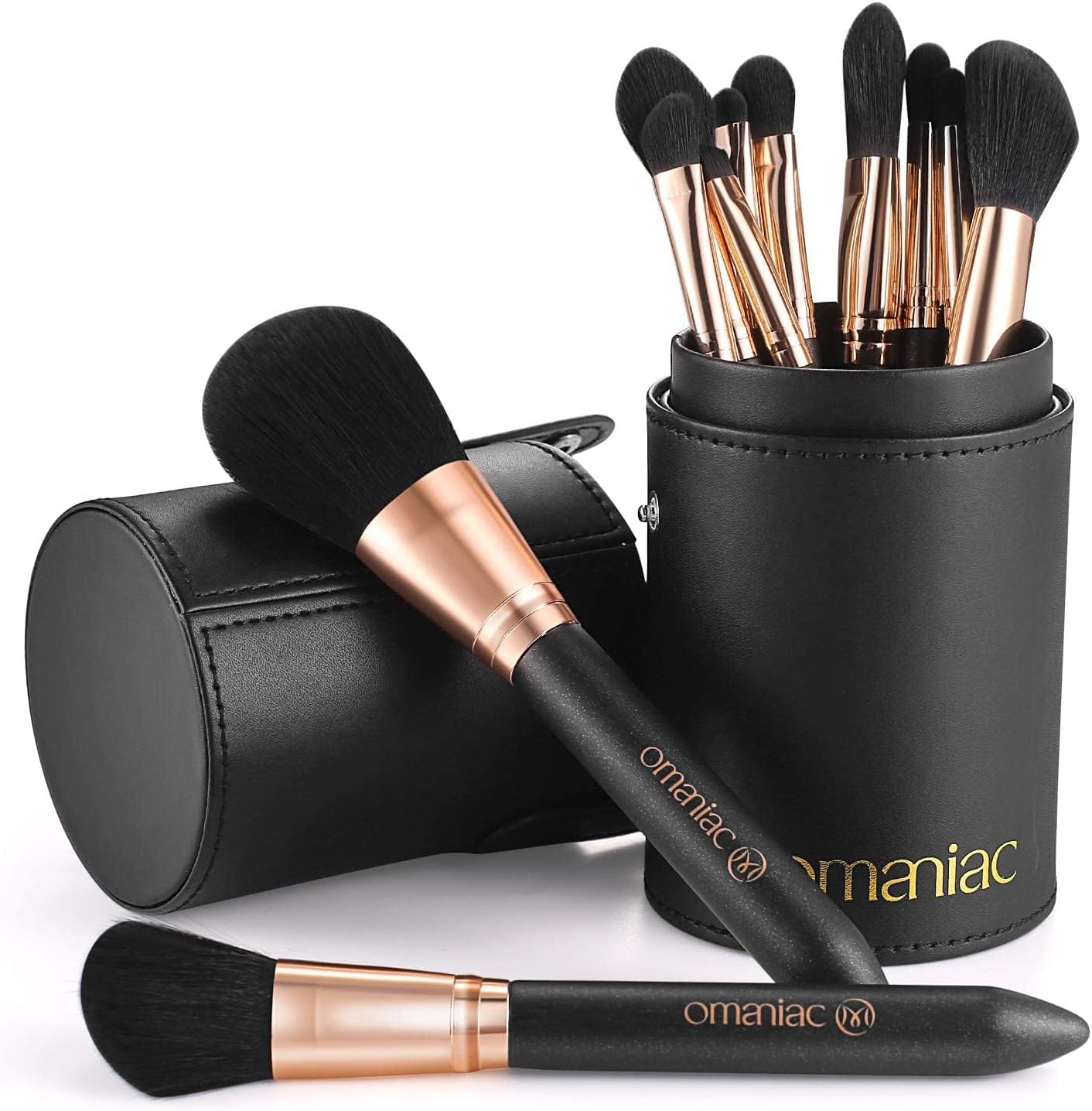OMANIAC professional makeup brush set front view featuring twelve black and rose gold brushes neatly arranged.
