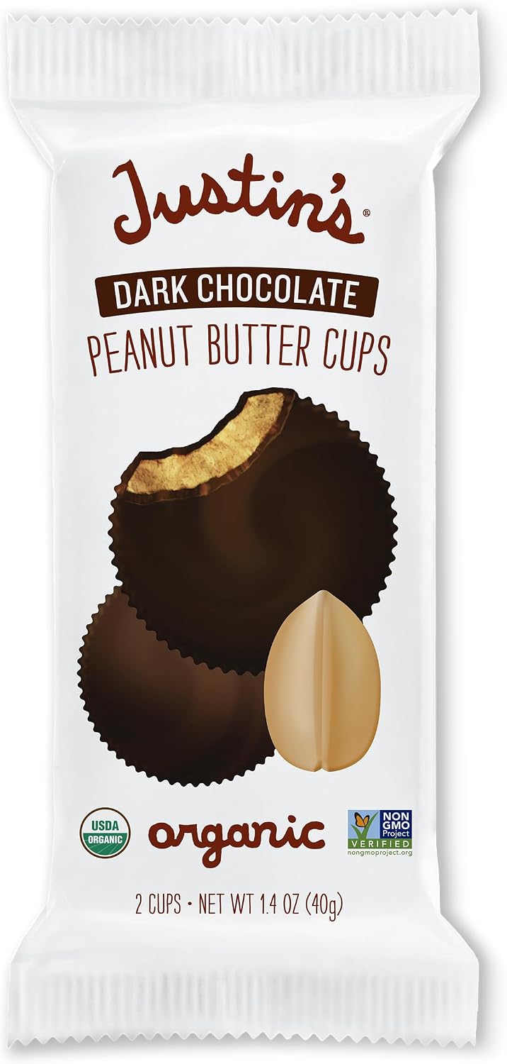 Premium organic dark chocolate nut butter cups unboxed on a white background