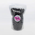 Gluten free and vegan caffeinated espresso bean snack treats close up view.