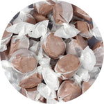 Wrapped Blue Raspberry and Chocolate salt water taffy candies close up
