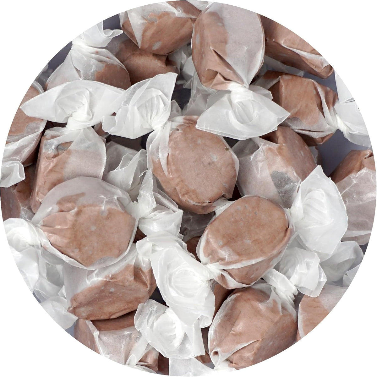 Wrapped Blue Raspberry and Chocolate salt water taffy candies close up