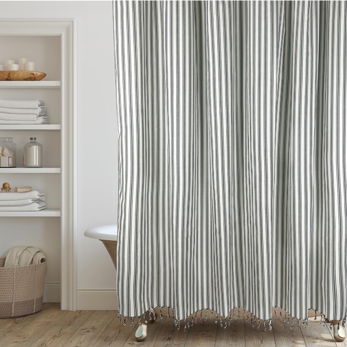 Hall And Perry Modern Transitional Stripe Shower Curtain front view displaying elegant vertical black and cream lines hanging in a brightly lit bathroom setup.