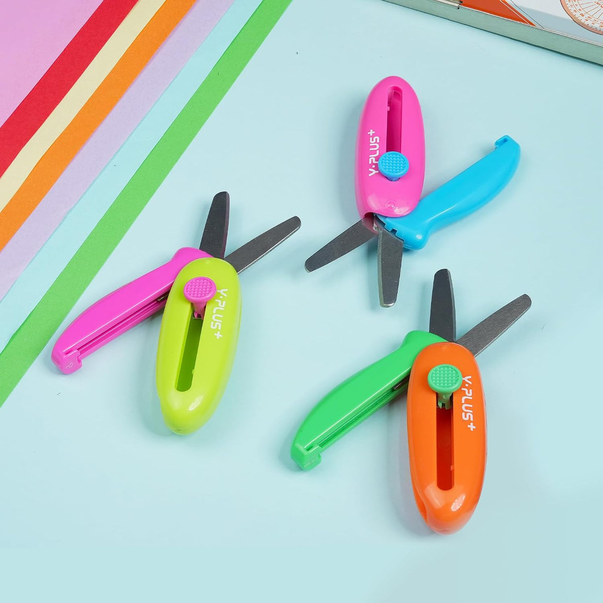 YPLUS orange toddler scissors angled view highlighting blunt tip safety.