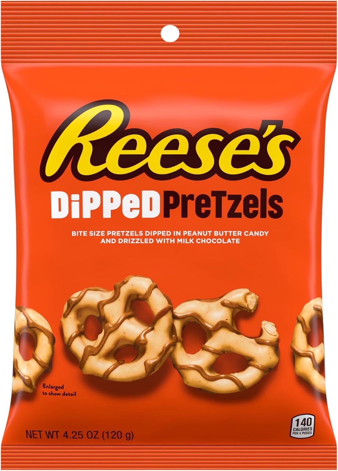 Reese's Dipped Pretzels spilled out of the bag on a table