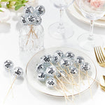 1970s retro theme party cake decorated with reflective spherical mirror toppers