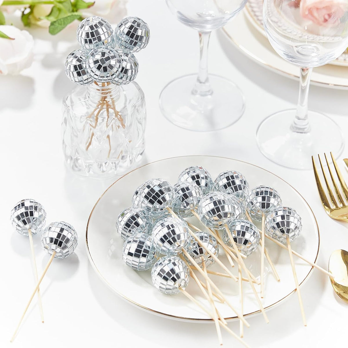 1970s retro theme party cake decorated with reflective spherical mirror toppers