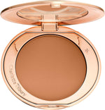 Charlotte Tilbury Airbrush Flawless Finish Setting Powder Deep front view compact for pore blurring face makeup