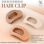 Model wearing a brown flat claw clip comfortable against head support