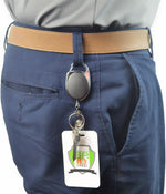 Specialist ID retractable reel clipped onto a belt loop demonstration.