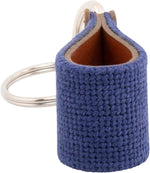 Huck Venture leather key fob styled on flat surface