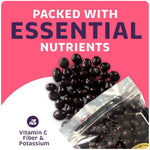 Gourmet dark chocolate covered cherries in a glass bowl