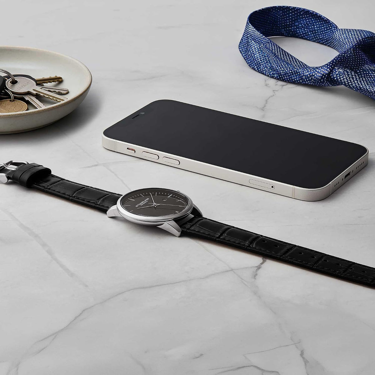 Stuhrling Original men's watch paired with formal wear for style inspiration.