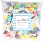 Assorted flavors salt water taffy candies spread out individually wrapped