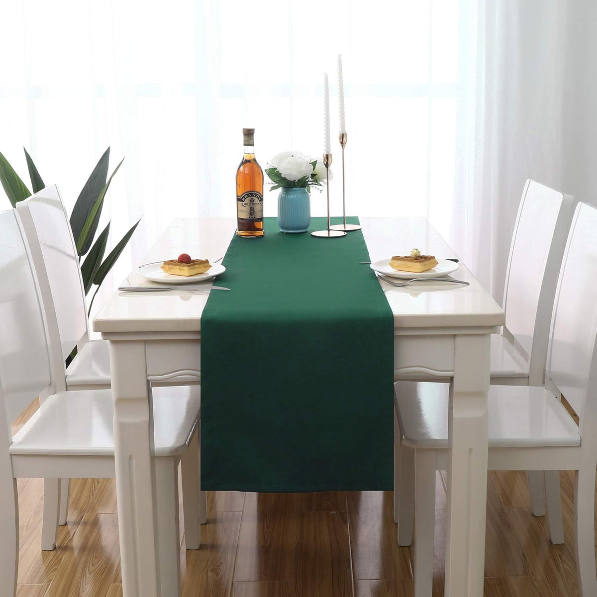 Close up of solid green polyester table runner fabric weave