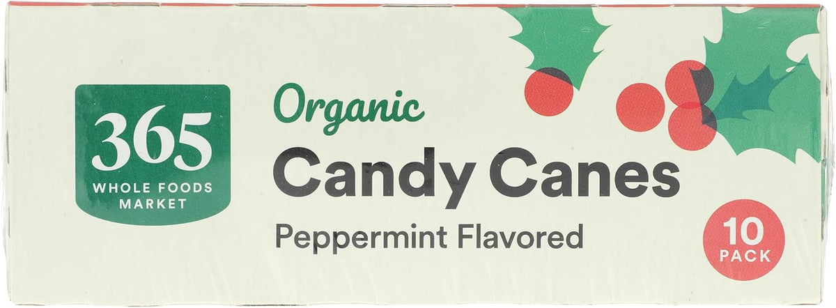 Dye free peppermint candy canes individually wrapped next to hot chocolate