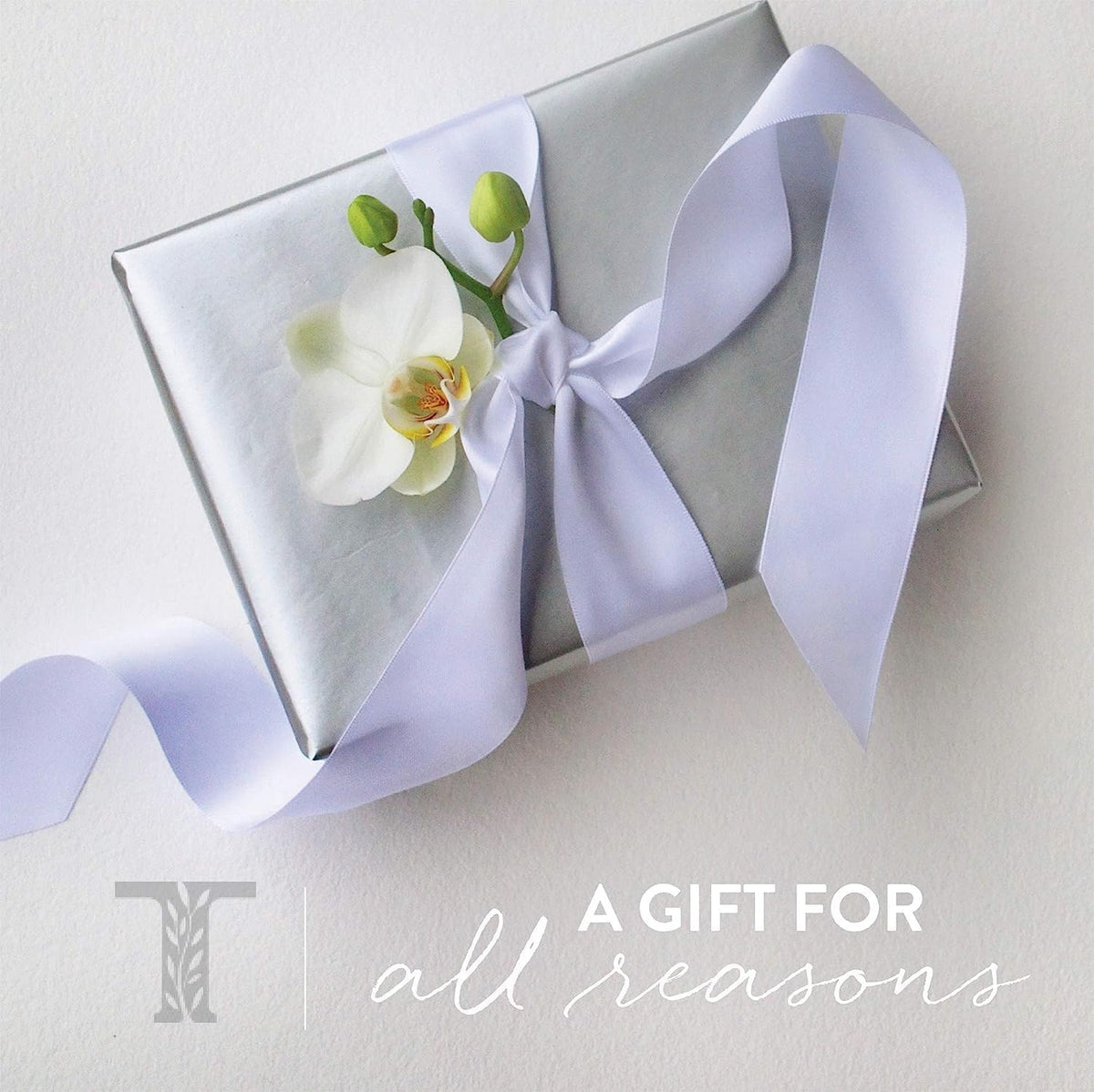 Thymes Kimono Rose Body Lotion lifestyle setting with floral elements