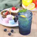 Darlion blue glass set showing embossed sunflower and stripe pattern