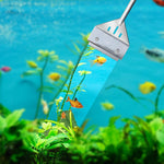 Multi functional scraper being utilized as a substrate spatula for arranging aquarium sand.