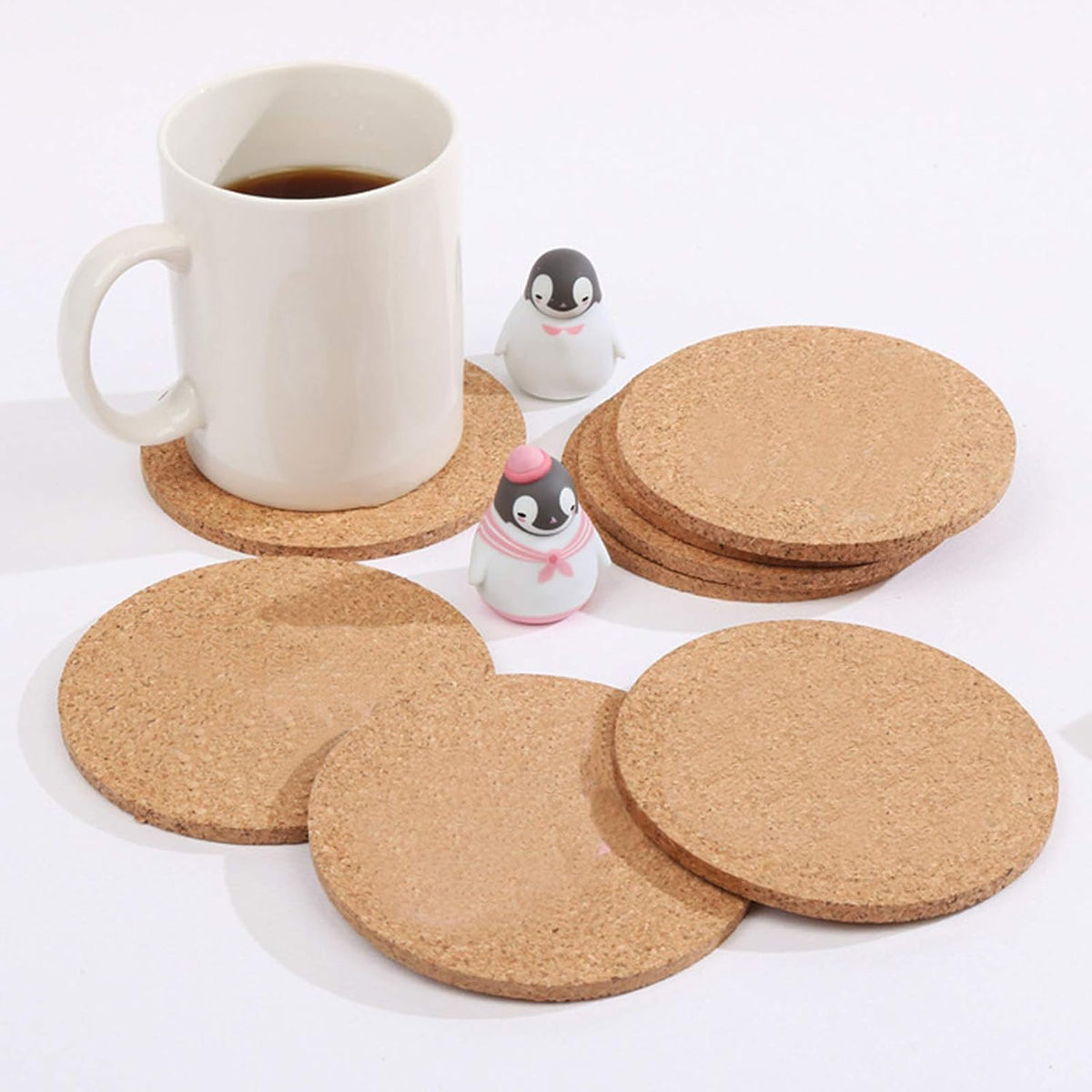 HUAOAO absorbent cork coaster holding a hot coffee mug