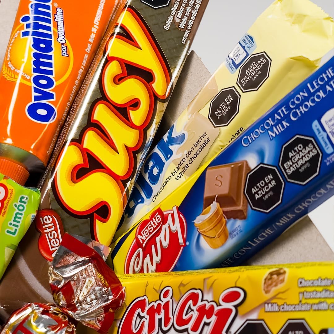 Authentic Venezuelan cookies and chocolate bars from Calesbox arranged neatly on a surface.