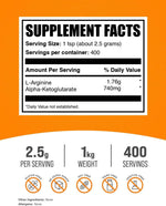 BulkSupplements Arginine Alpha Ketoglutarate pure powder supplement texture and scoop view.