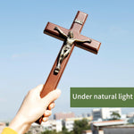 ARCHOBAN wooden crucifix displayed on a living room wall for home decoration.