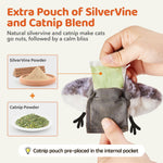 Adult cat kicking and biting the touch-activated electronic bird kicker toy.