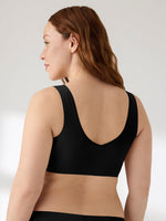 True & Co women's wireless bra showing deep V-back silhouette and smooth design.