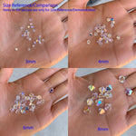 Collection of Adabele crystal beads in trademark packaging