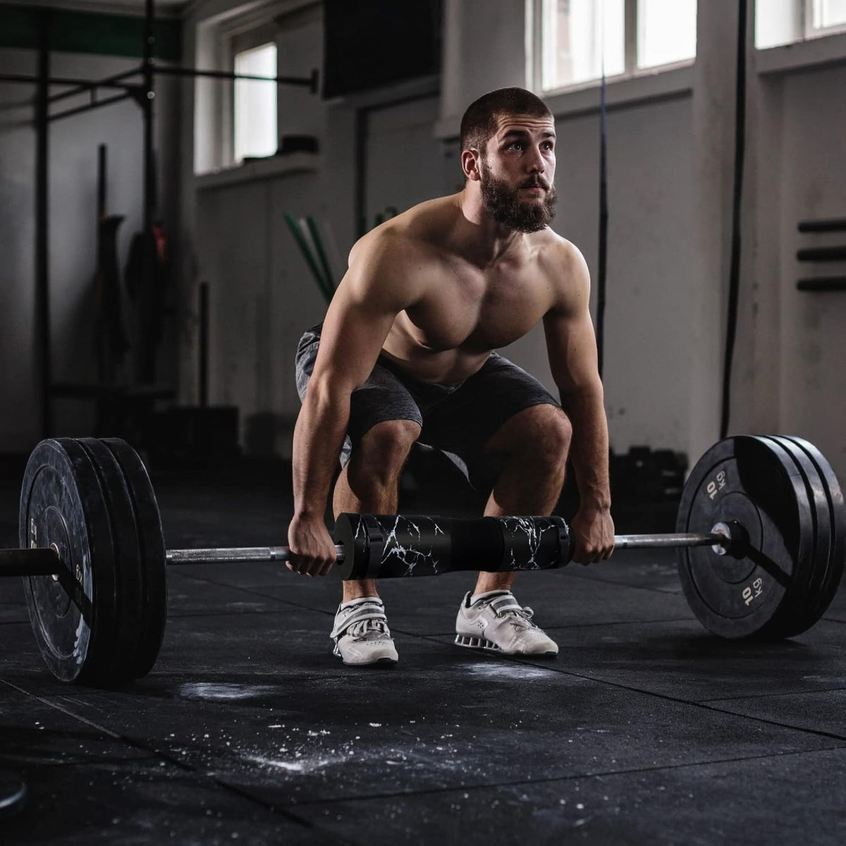 POWER GUIDANCE Barbell Squat Pad demonstrated during a squat exercise