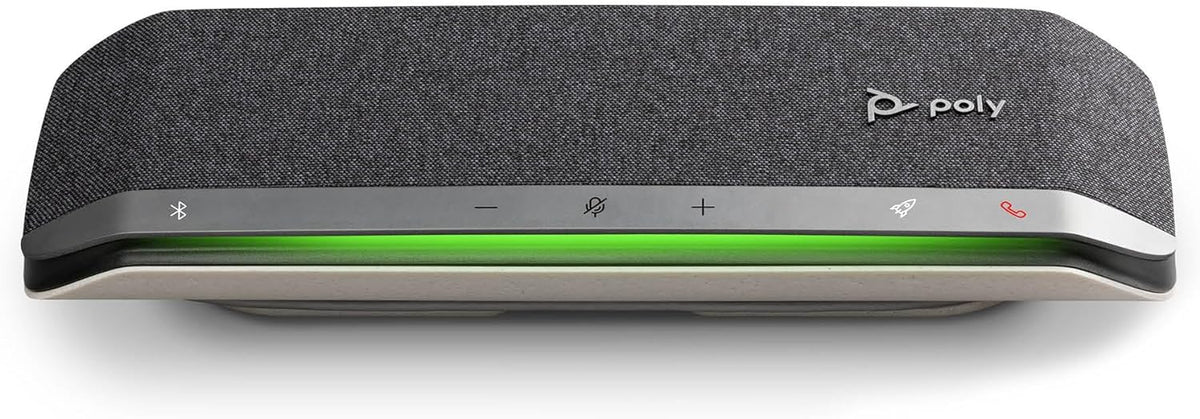 Poly Sync 40 speakerphone placed on office desk connected to laptop for video calls