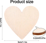 Close-up view of unfinished smooth wooden heart cutouts