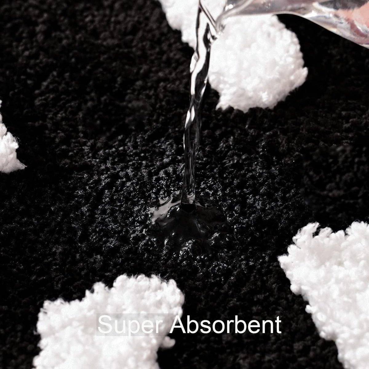 Close up of soft microfiber shaggy texture and white tufted lettering