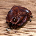 Wugebud brown leather pouch scale reference in hand