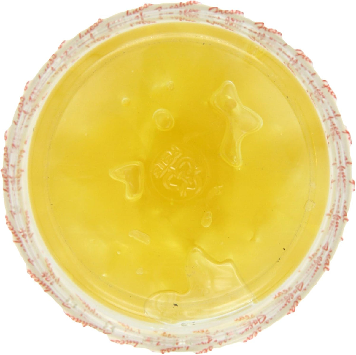Close up of sweet candied pineapple wedges in a bowl