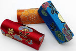 Satin silky fabric texture and gold snap button closure