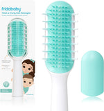 Frida Baby kids hair grooming tool in packaging