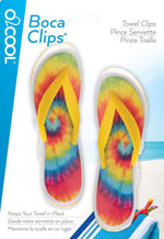 O2COOL tie dye flip flop towel clips mounted on a lounge chair