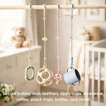 Andy Bear baby toy safety straps attached to a stroller