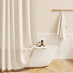 BTTN Boho Farmhouse Shower Curtain front view hanging in modern bathroom.