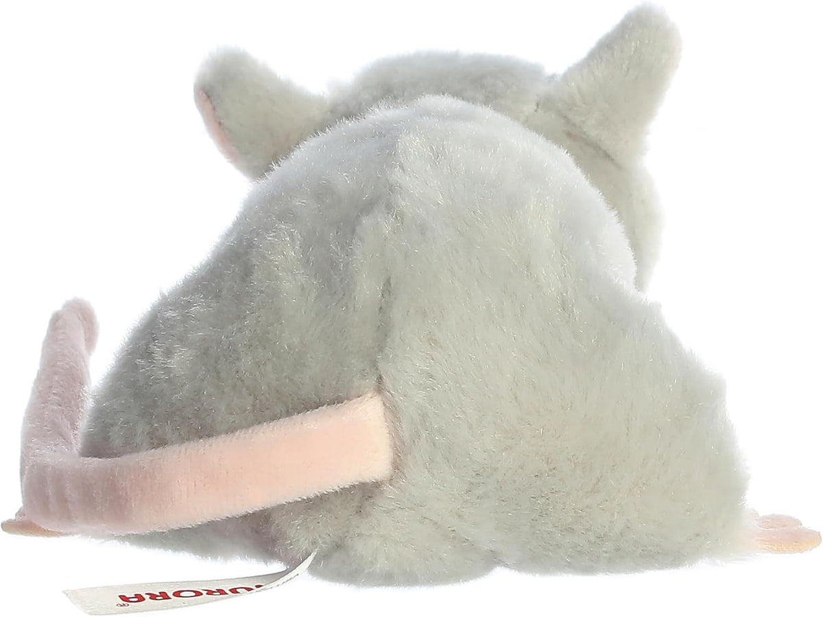 Aurora Mini Flopsie mouse resting on belly displaying bean-filled stability