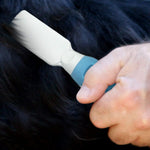 Packaging view of the authentic USA imported Pets First professional pet mat remover for dogs and cats