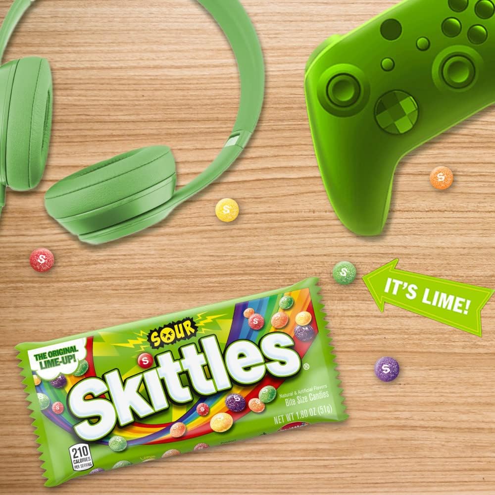 Skittles Sour candy pieces arranged by flavor including strawberry lemon and lime.