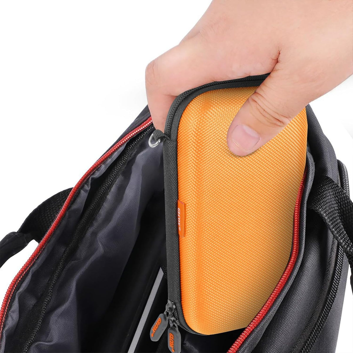 GLCON orange travel pouch packed with power bank and cables