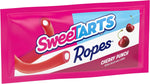 Close up of soft bendable SweeTARTS candy ropes showing the sweet sour core