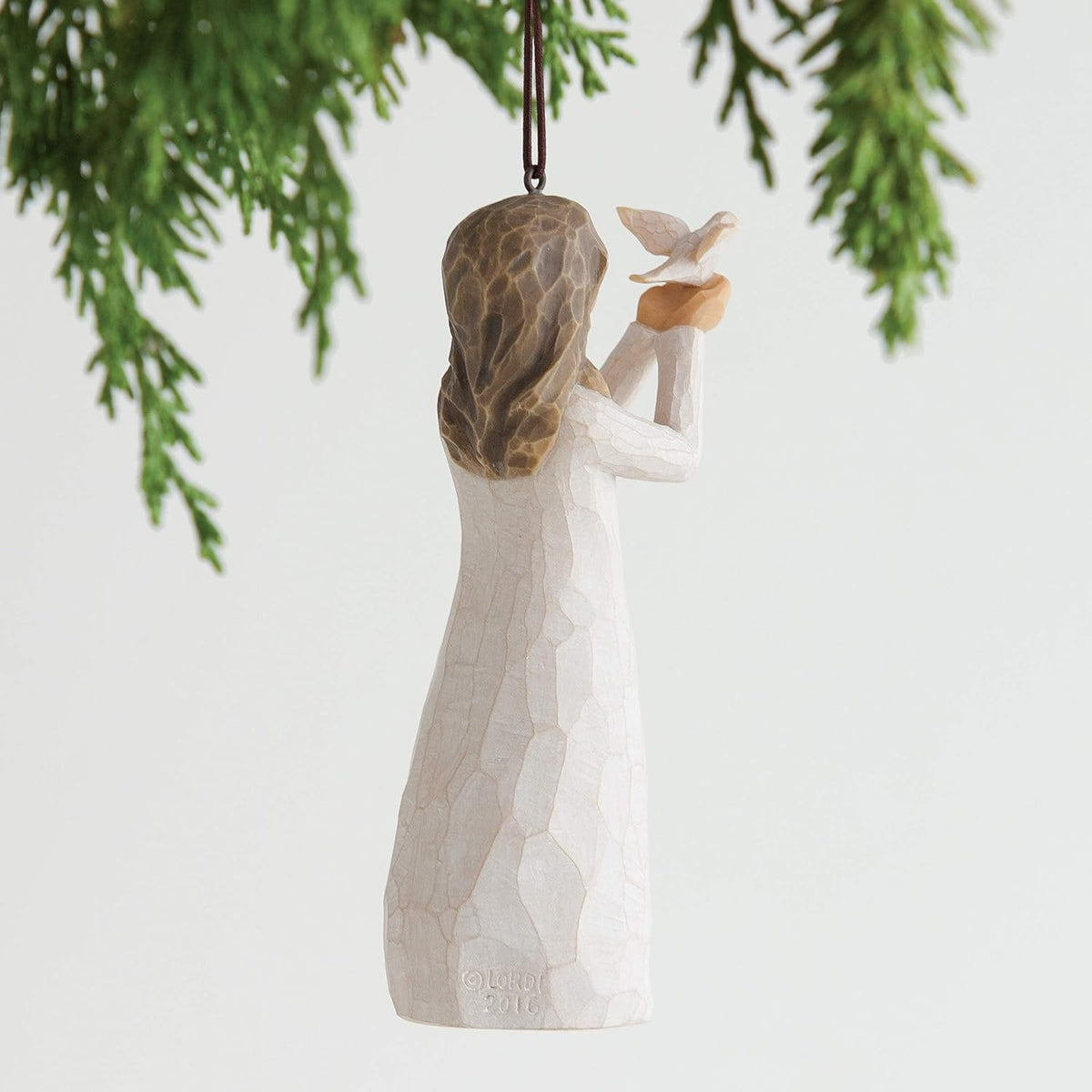 Willow Tree Soar sculpted resin figure close up of face and dress