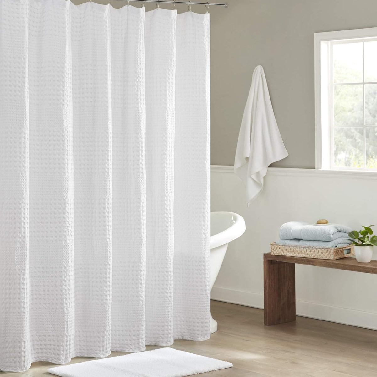 Madison Park Arlo 100% Cotton Shower Curtain front view hanging in a bright modern bathroom setting