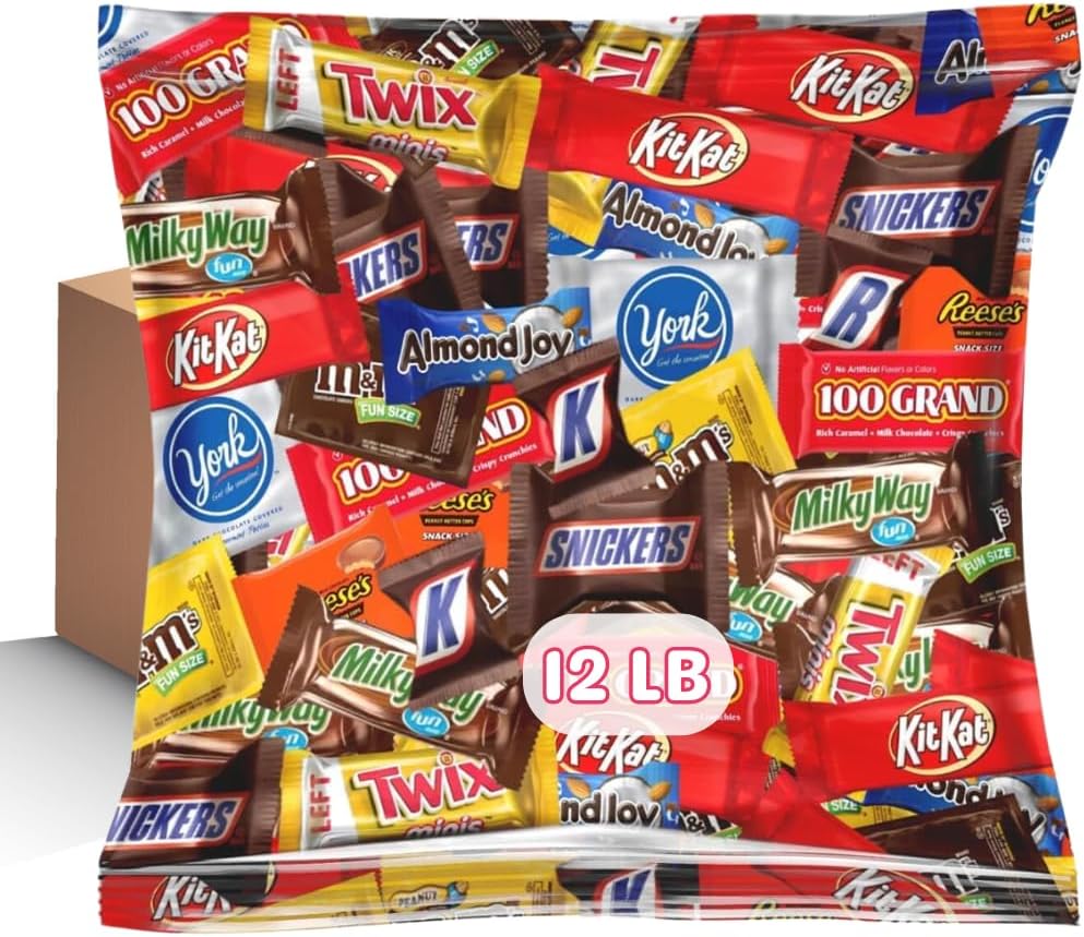Individually wrapped snack size party chocolate mix scattered on a surface