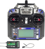 Flysky FS-i6 RC transmitter front view with dual joysticks and LCD screen.