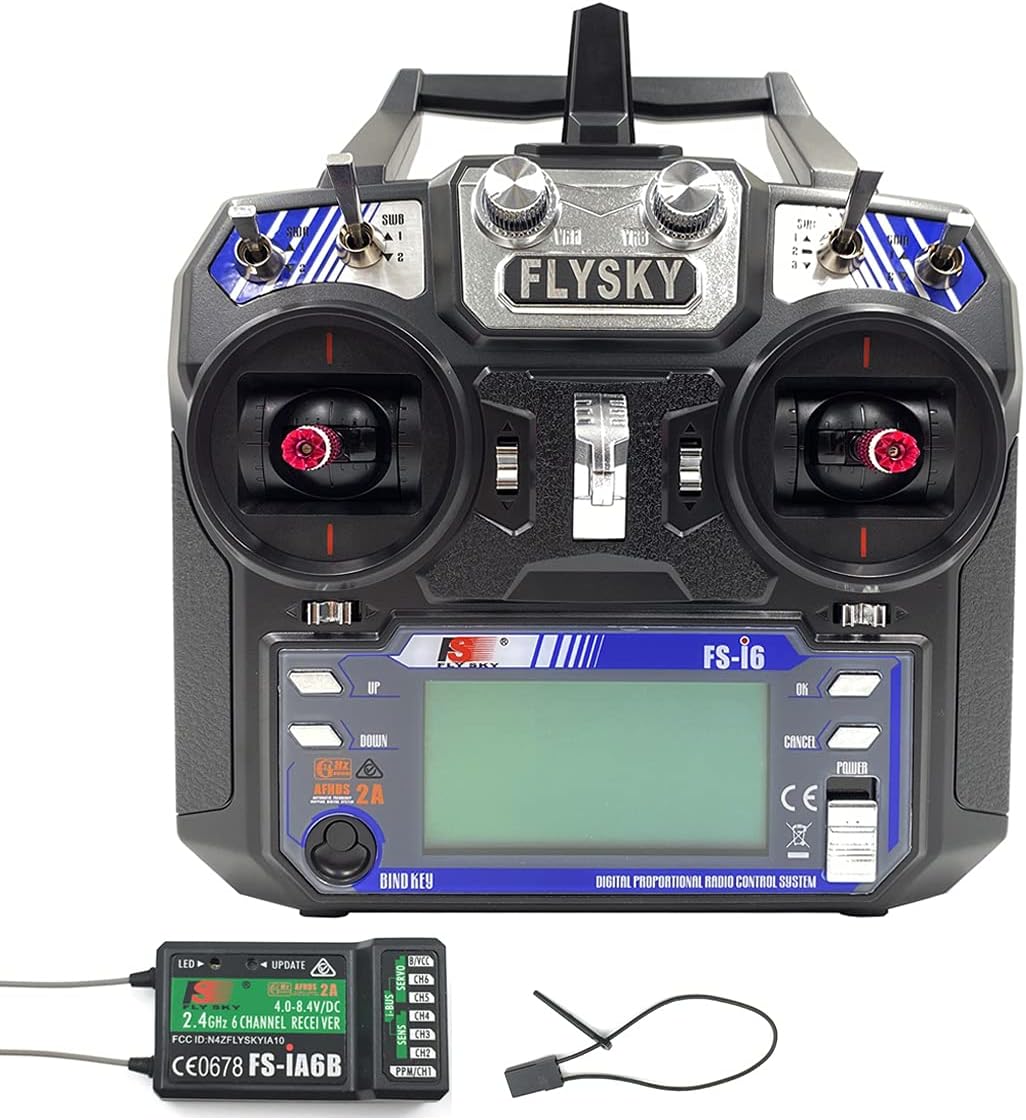 Flysky FS-i6 RC transmitter front view with dual joysticks and LCD screen.
